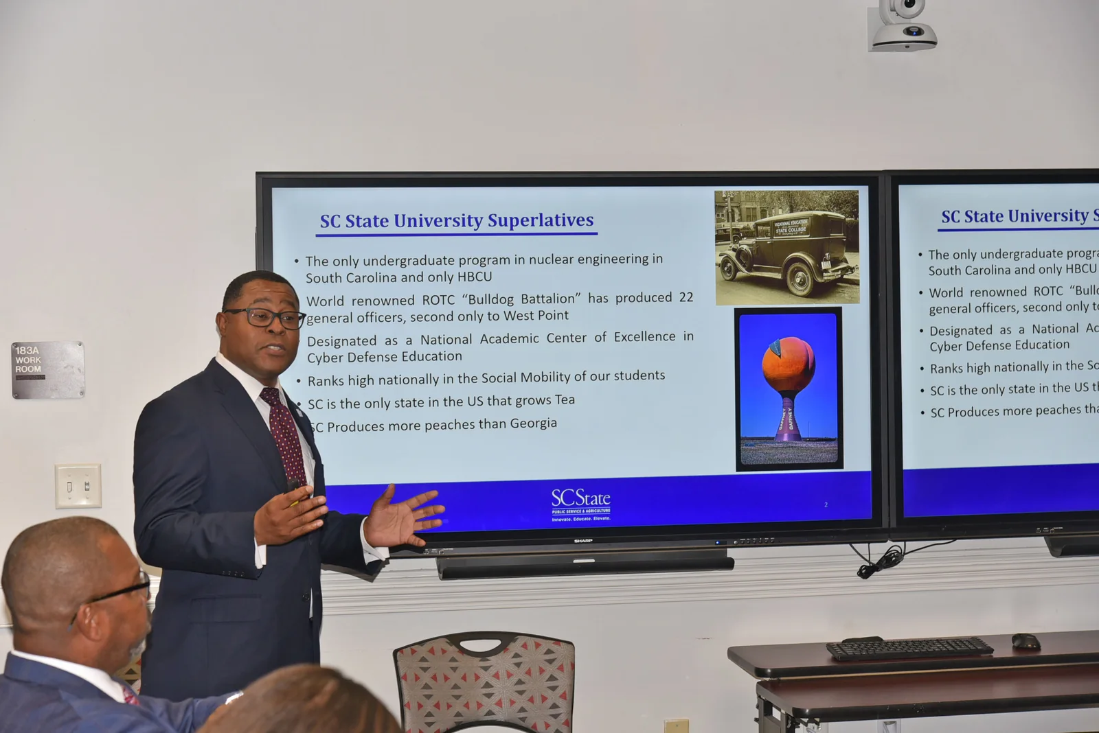 Dr. Louis D. Whitesides presenting before colleagues